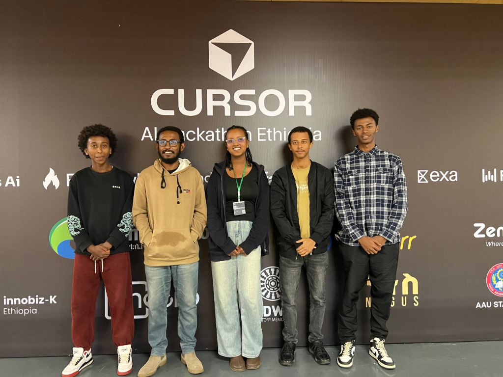 Authentic Cursor AI Hackathon Ethiopia team photograph at Adwa Memorial Museum podium celebration